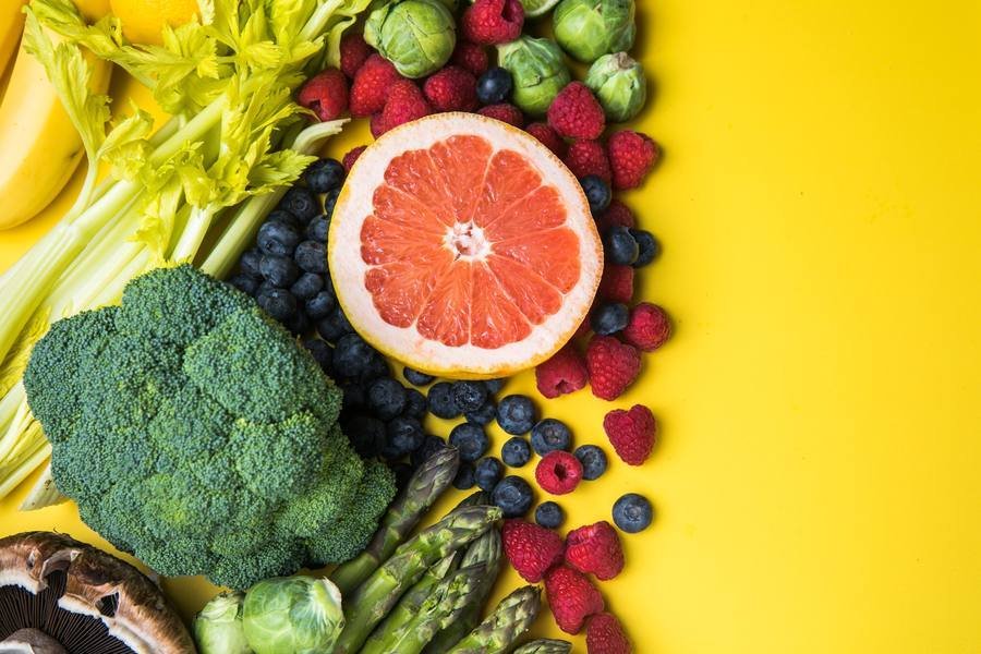 Colorful fruits and vegetables rich in antioxidants — berries, broccoli, grapefruit for hearing protection