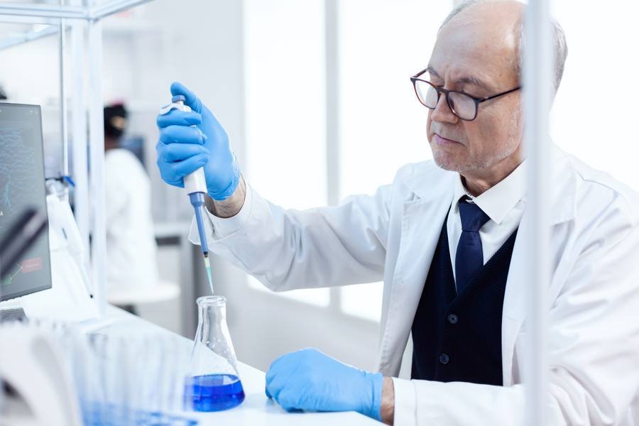 Scientist in laboratory conducting clinical research on thermogenic supplement compounds